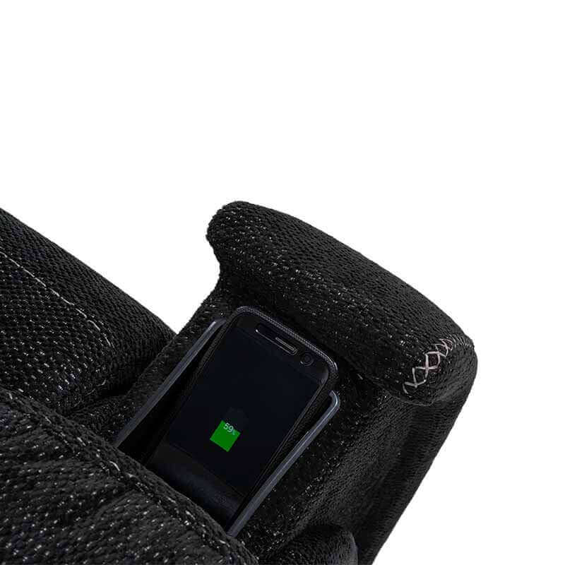 Close-up view of a smartphone resting in a side storage pocket of a black Mega Motion MM-3712 Power Lift Recliner with 3-Zone Heat