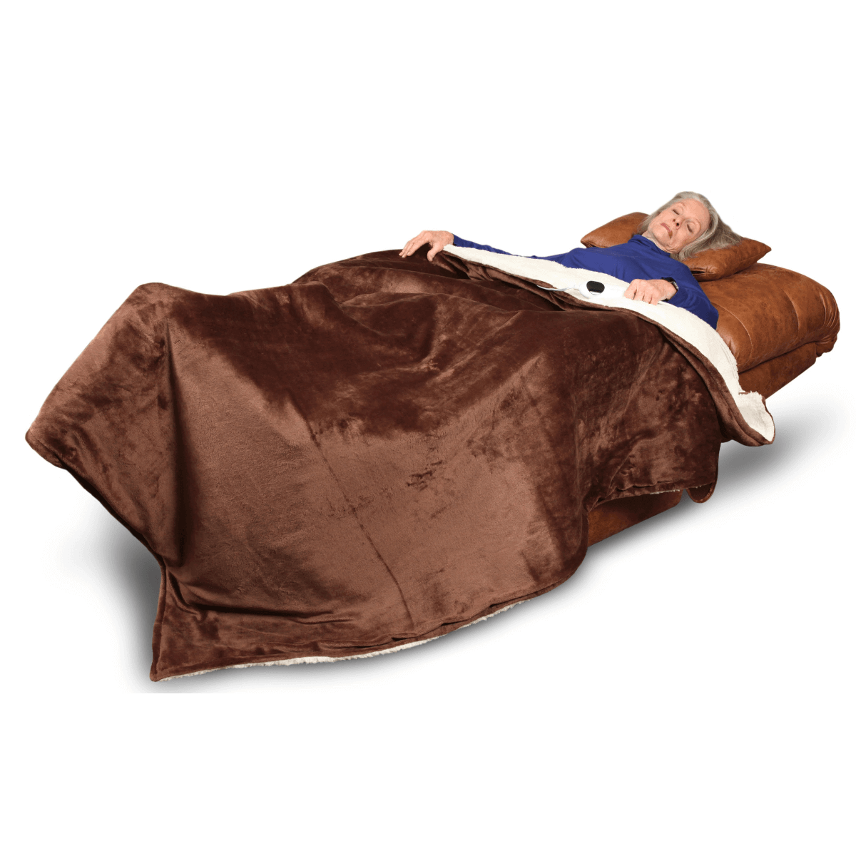 Older woman sleeping in a tan Duralux Perfect Sleep Chair, fully extended with brown blanket covering her