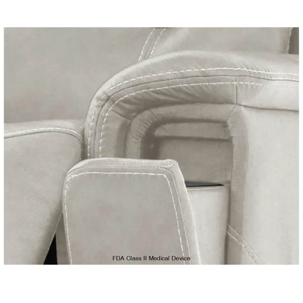 Mega Motion power lift recliner in dove color with close up view of cup holders
